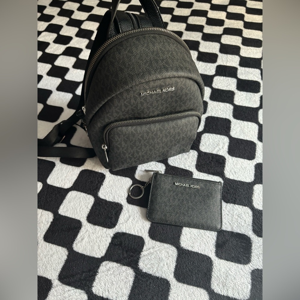 michael kors black monogram backpack and wallet